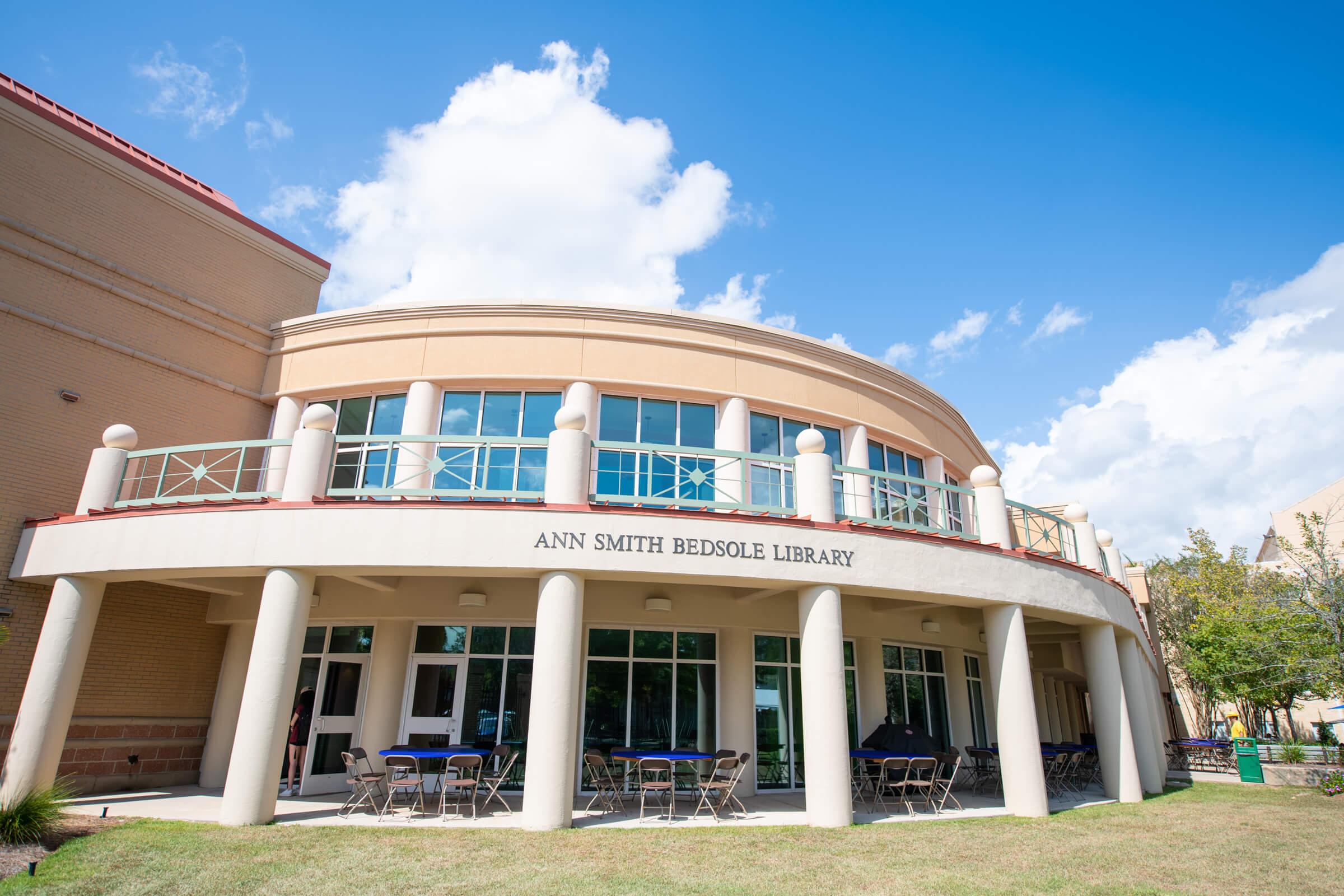 Wideangle photo of the Ann Smith Bedsole Library exterior